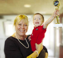 Photo of Debbie Yakabosky and one of her students